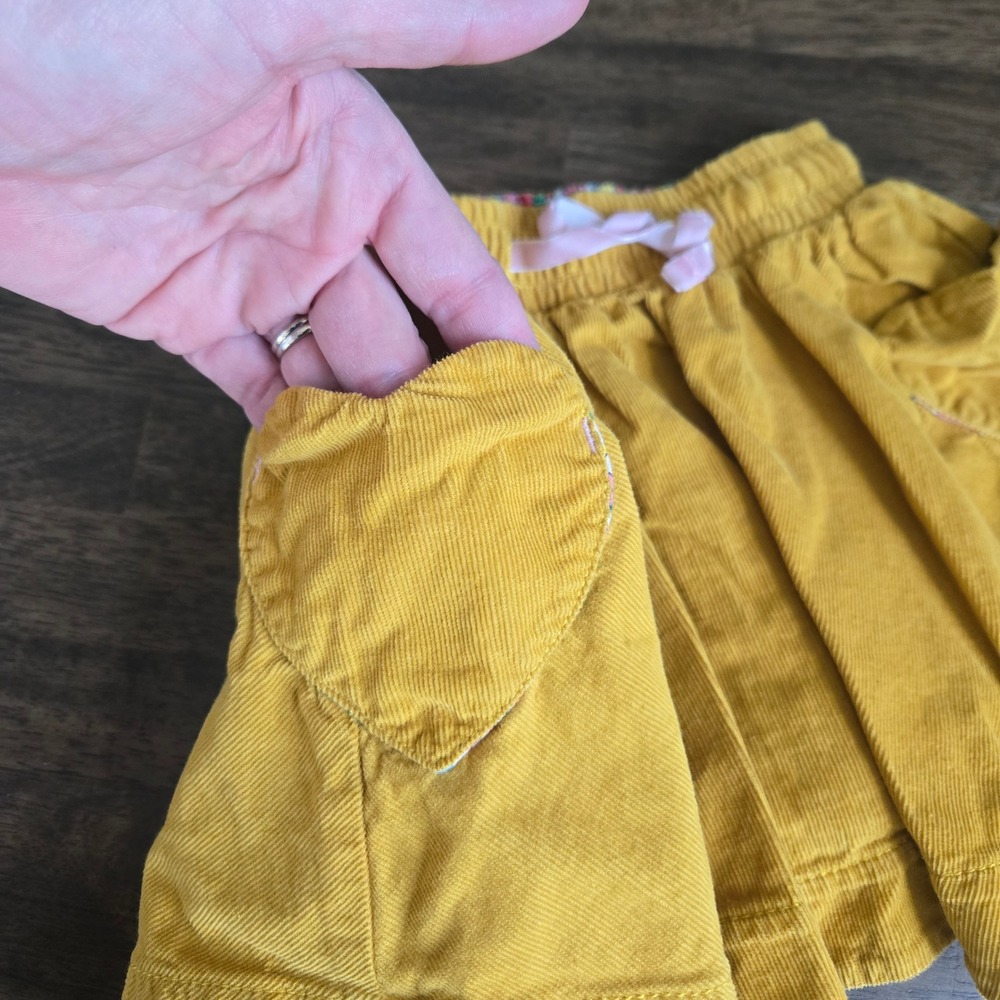 Mini Boden Girls Mustard Yellow Corduroy Skirt Heart Pocket Floral Lining 2-3Y - Picture 3 of 6